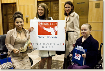 Kelly Rouba (far right), of EAD, at the Disability Power and Pride Inaugural Ball in Washington, DC. Ms. Rouba was a member of the Ball's Event Media Committee along with Juliette Rizzo (far left), Director of Exhibits & Event Planning for the Dept. of Education, and Kendra Kojcsich, of Porter Novelli. Pictured second from the right is Jordan Silver, founder of Ag Apparel, an accessible clothing line.